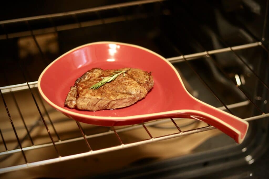 Cherry Brookline Skillet Plate with a steak on it