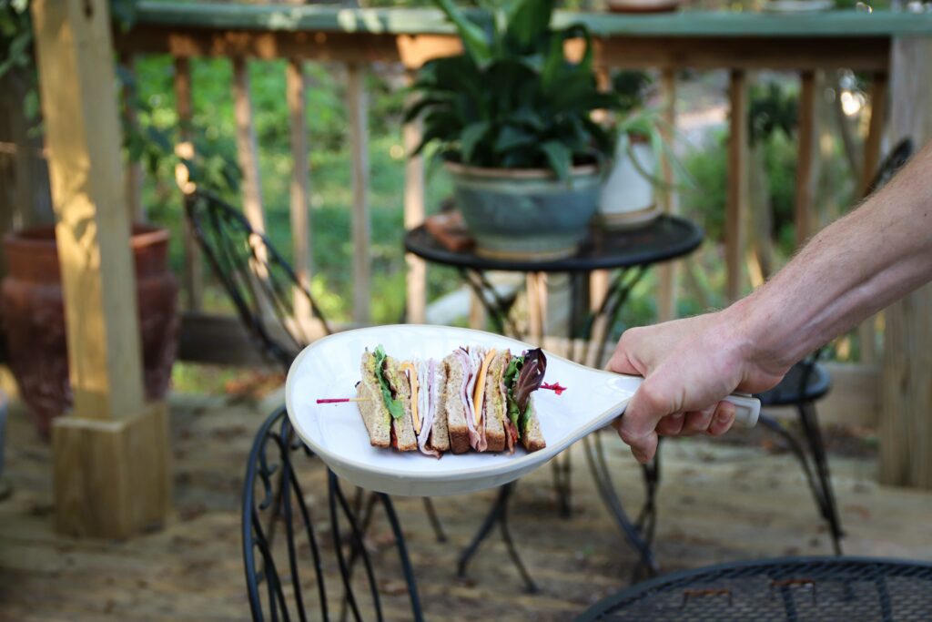 Ivory Brookline Skillet Plate dressed with a club sandwich