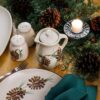 Pinecone dinner table setting with posie pitcher oval tray salt pepper and coupe dinner