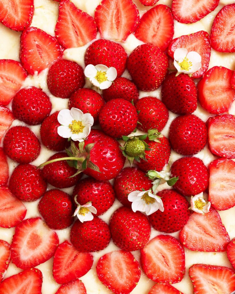 Fresh strawberries on cheesecake.